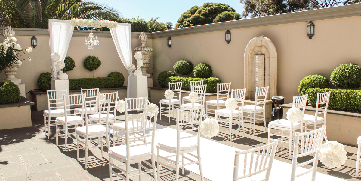 A wedding setting in the courtyard at Manor on High