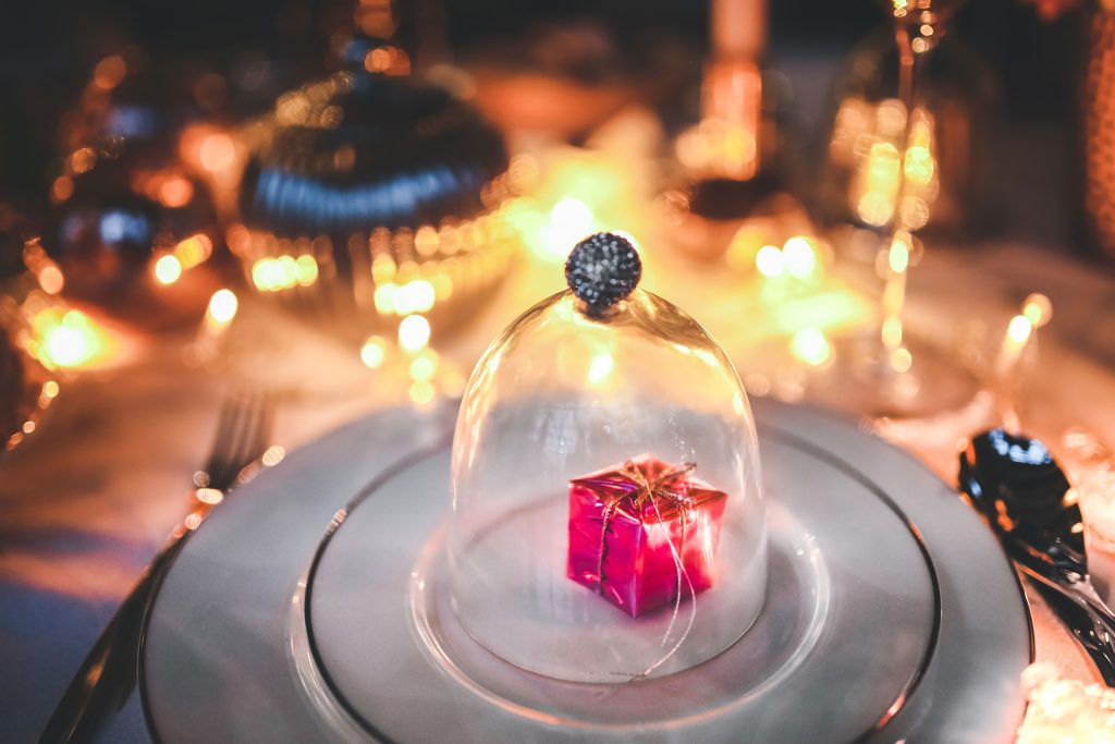 Wedding table place setting with gift at Manor on High